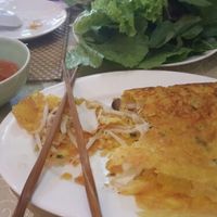 Banh Xeo (Vietnamese pancake filled with mushroom, served with greens for wrapping) at San May - Q10 in Ho Chi Minh City