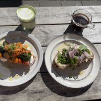 Avocado kimchi toast & matcha latte // smashed peas toast & americano  at Farm2Table - Davidshall in Malmo