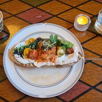 Kimchi toast breakfast with coffee and water. That's a table it's served on, not the floor. at Farm2Table - Davidshall in Malmo