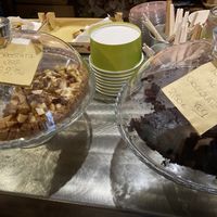 Some of the desserts served today: a pie with jam apples and nuts and a chocolate cake   at La Reverie in Parma