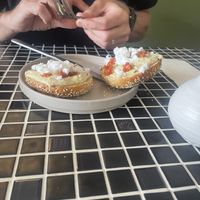 Everything bagel with vegan feta, jalapeño hummus and sun dried tomatoes   at Last Light Coffee in Blackpool