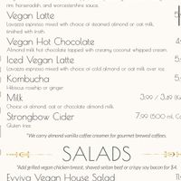 Drinks and salads at Evviva in Toronto