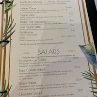 Drinks and salads at Evviva in Toronto