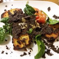 the most incredible potatoes served with a vegetable puree freshly shaved black truffle at Racines Bruno Cirino in Nice