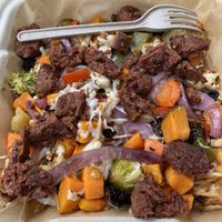 Breakfast Bowl with hash browns and roasted veggies  at The Plant Based & Juice Bar in Danville