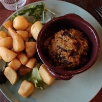Brasato di seitan al Barolo con patate arrosto at Il Pangolino in Casale Monferrato