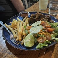 Curry wurst with vegan sausage substituted  at Cafe Europa in Liberia