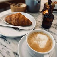 Coffee with almond milk   at Do Largo in Evora