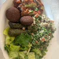 “vegetarian plate” with falafel, moussaka (eggplant), mujadarah, meatless grape leaves, tabbouleh, and dairy free (no feta) salad!   at Albasha Greek & Lebanese - Citiplace Court in Baton Rouge