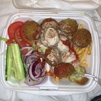 falafel plate with mix of sauces  at Clemens Falafel in Lund