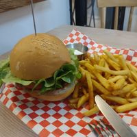 Vegan bacon cheeseburger and fries. Excellent 👌🏽 at Kiez - Vegan Butcher Cafe & Bistro in Hanoi