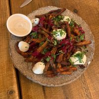 best seller sweet potato fries with vegan truffle mayo on the side (love them) at Honest Greens in Lisbon