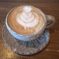 Latte with soy milk. They have soy, oat, and almond.   at Honest Greens in Lisbon