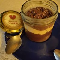 Chocolate based desert with cream and crunchy bits at Libra in Bologna