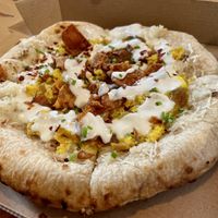 They now have brunch on Sunday 10-1pm. Breakfast Pizza.  at Nom Eats with Seats in Reno