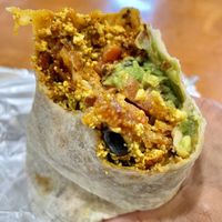 Now that’s what I call a breakfast burrito. Tofu scram, soyrizo, hash brown, black beans, cheese, chipotle sauce, pico, avocado. M  at Nom Eats with Seats in Reno