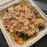 Seitan nachos- homemade chipotle cream sauce and seitan, so good at Nom Eats with Seats in Reno
