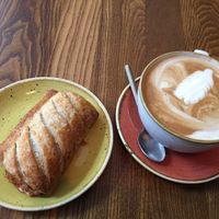 Vegan Mediterranean roll and delicious latte with coconut milk   at Esquires Coffee in Dorking