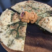 Pizza bread starter (vegan option) at The Views Vegetarian Restaurant in Kaiteriteri