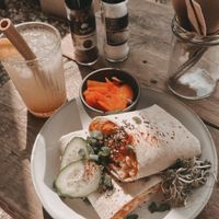 Pea wrap with kimchi on the side and ginger lemon   at Jungle Café & Catering in Eindhoven