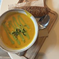 The soup is always SO good here 💚 the vegan worstenbroodje is not included but can recommend to order as well😄 at Jungle Café & Catering in Eindhoven