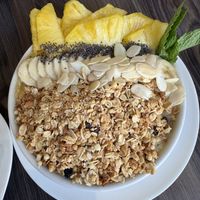 Yellow bowl
Pineapple, mango and banana smoothie bowl, garnished with granola, chia and seasonal fruits.  at Cafe Central Traveler's Coffee in Cartagena