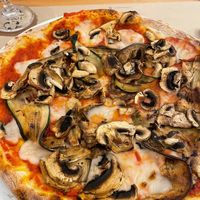 Mushroom, bell pepper and vegan mozzarella pizza. at La Focacceria Pugliese (Benfica) in Lisbon