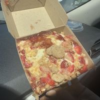 Strawberries and banana cream cinnamon roll   at Cinnaholic in Concord