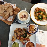 Plain toast and jam, tofu on toast and my English breakfast made from extra ingredients  at bigmoose coffee co in Cardiff