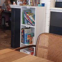 all the books! at bigmoose coffee co in Cardiff