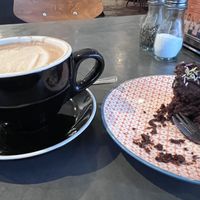 Oat milk mocha and vegan chocolate cake  at bigmoose coffee co in Cardiff