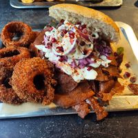 Vöner with onion rings at Bärenstark in Cologne