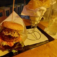 The den burger and gin fizz at The Botanical Den in Lisbon
