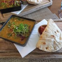Chick Pea & Green Lentil Dahl with
Crispy shallots, coriander, naan bread & lime pickle at Victoria's in Pitlochry