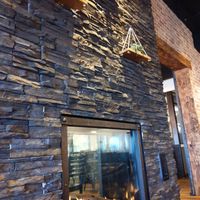 Double sided fireplace at New Holland Coffee Co in New Holland
