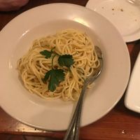 Side of pasta with garlic and oil at Venetian Hot Plate in Port Aransas