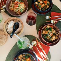 Papaya salad, ginger tofu, and basil tofu at Ukulele Thai Bar & Food in Luxembourg City