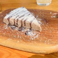 Chia pudding with chocolate sauce and coconut flakes  at 2084 in Kowloon