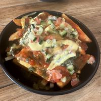 Triple cooked cheese loaded chips   at 2084 in Kowloon