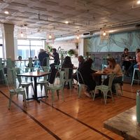 Lots of seating and people eating ham at The Green Room in Portsmouth