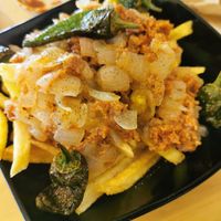 Fries gordiveganas at La Vegana Taperia in Malaga