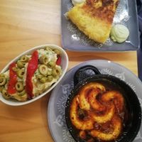 Tortilla de patatas, ensaladilla rusa y gambas al pil pil at La Vegana Taperia in Malaga