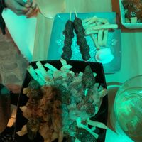 Loaded fries and Indian skewers  at La Vegana Taperia in Malaga