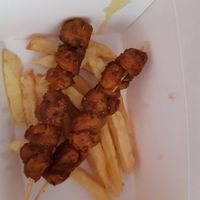 Skewers with fries at La Vegana Taperia in Malaga