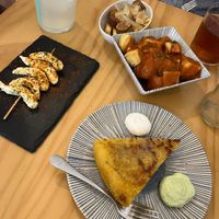 Gambas, tortillas Patatas, Patatas bravas and chorizo with fries at La Vegana Taperia in Malaga