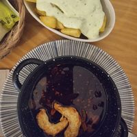 The (almost gone) gambas pil pil and the patatas alioli at La Vegana Taperia in Malaga