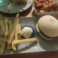 Seitan and garlic sauce with fries at La Vegana Taperia in Malaga