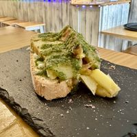 Potato with garlic sauce on breadd  at La Vegana Taperia in Malaga