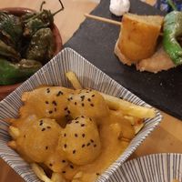 Pimientos padrón, albondigas con almendras, brocheta andaluz at La Vegana Taperia in Malaga
