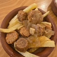 Chorizo in wine sauce at La Vegana Taperia in Malaga